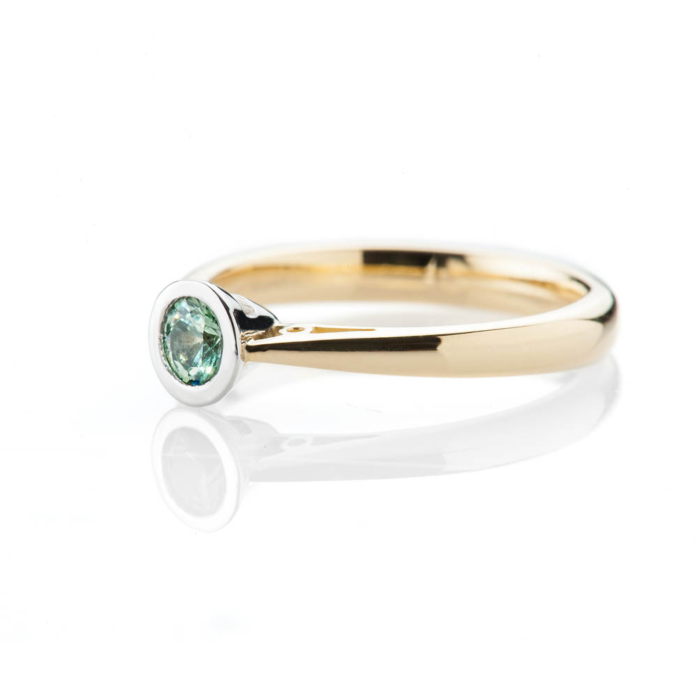 Elegant Vibrant Green Sapphire and Platinum Ring