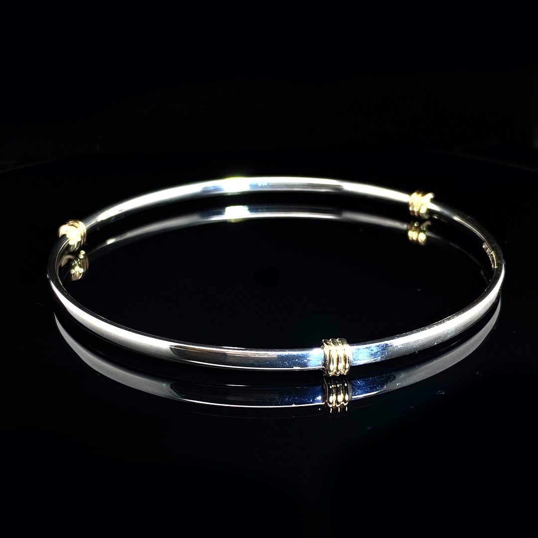 Sterling Silver andd Gold three wrap bangle by Heidi /kjeldsen Jewellery BL1309 on black