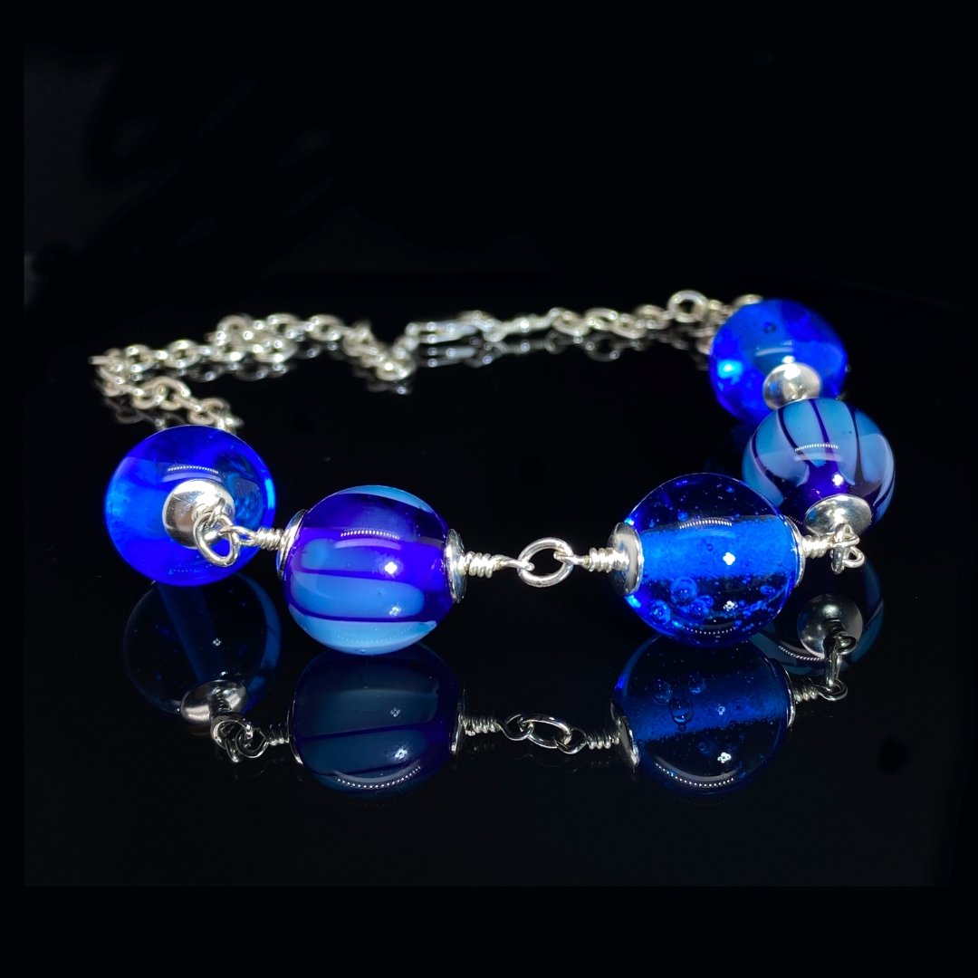 Blue Murano Glass By Heidi Kjeldsen Jewellery NL1256 on black