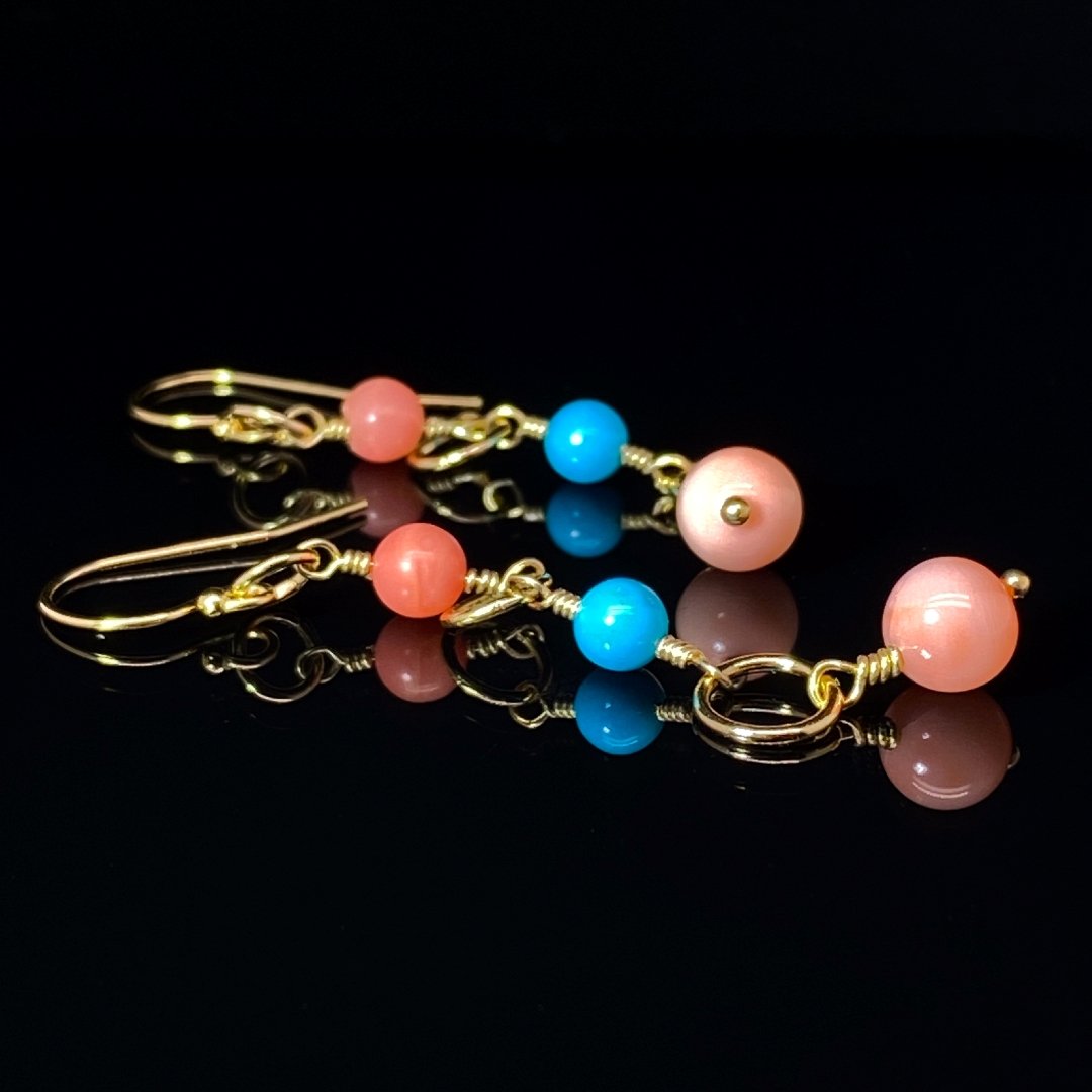 Delightful Coral and Turquoise Drop Earrings on black by Heidi Kjeldsen Jewellers ER2514