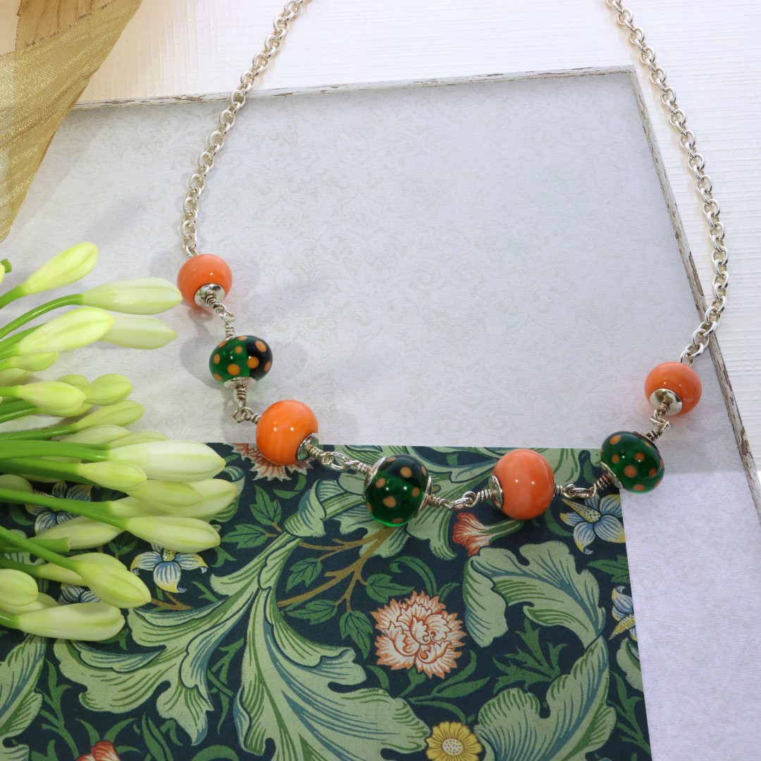Orange and green murano glass necklace by Heidi Kjeldsen Jewellery NL1273 still